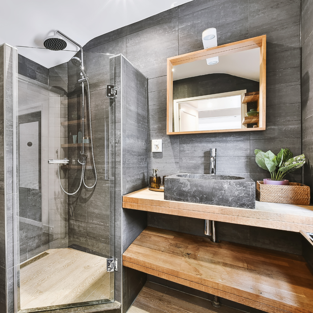 Aqua Escape Coastal Bathroom Decor Design using tile and stone that looks like weathered boards